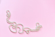 Feminine Desktop Mockup With Pearls On Pink Background With Copy Space.