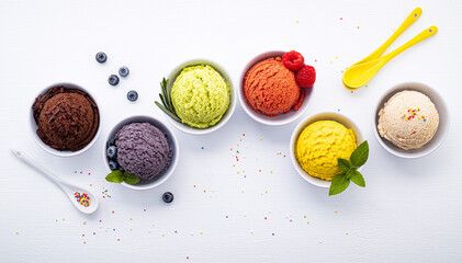 Aufkleber - Various of ice cream flavor ball blueberry ,lime ,pistachio ,almond ,orange ,chocolate and vanilla set up on white wooden background . Summer and Sweet menu concept.