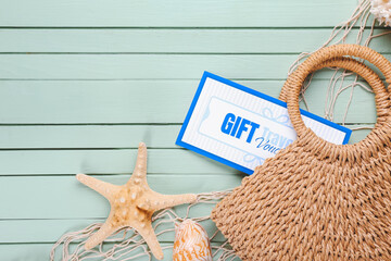 Sticker - Travel gift voucher, seashells and bag on color background