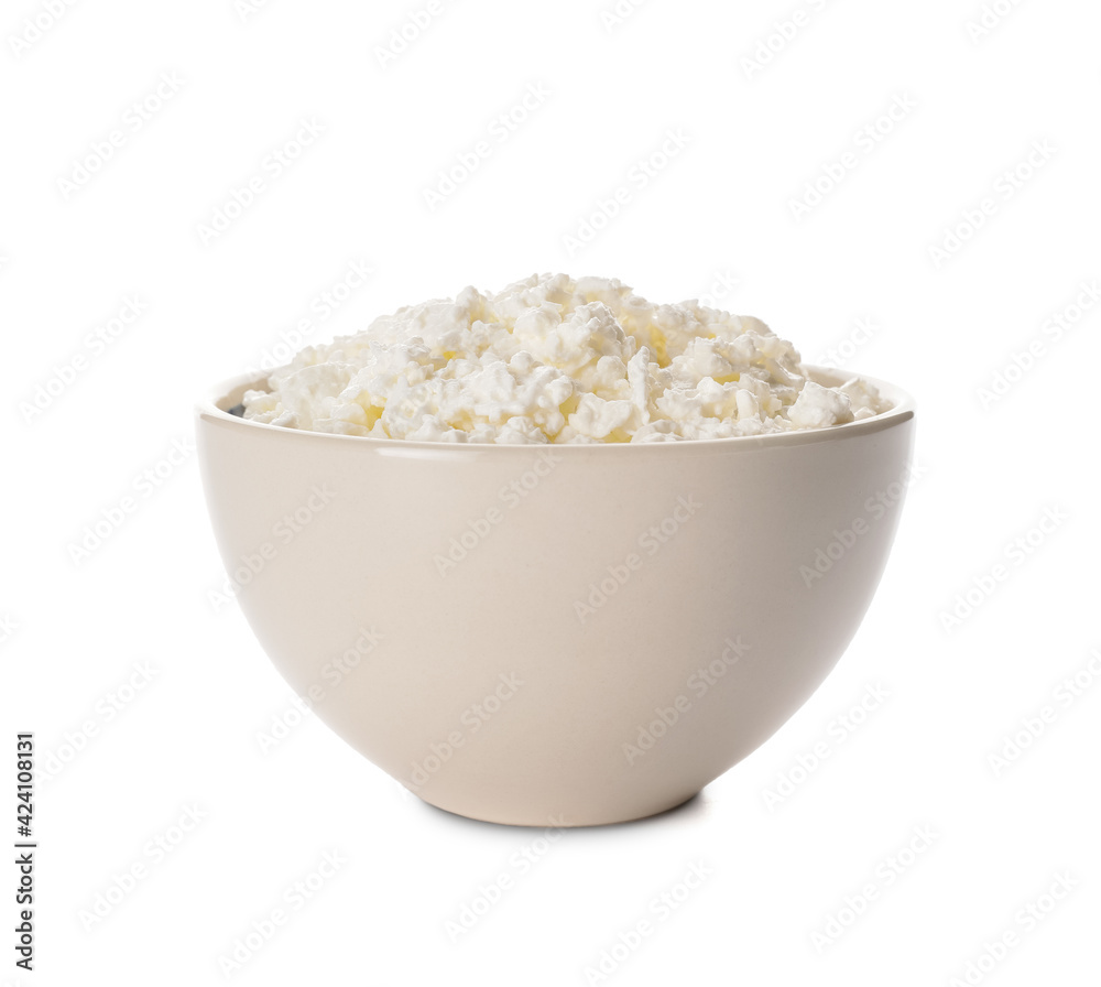 Bowl with cottage cheese on white background