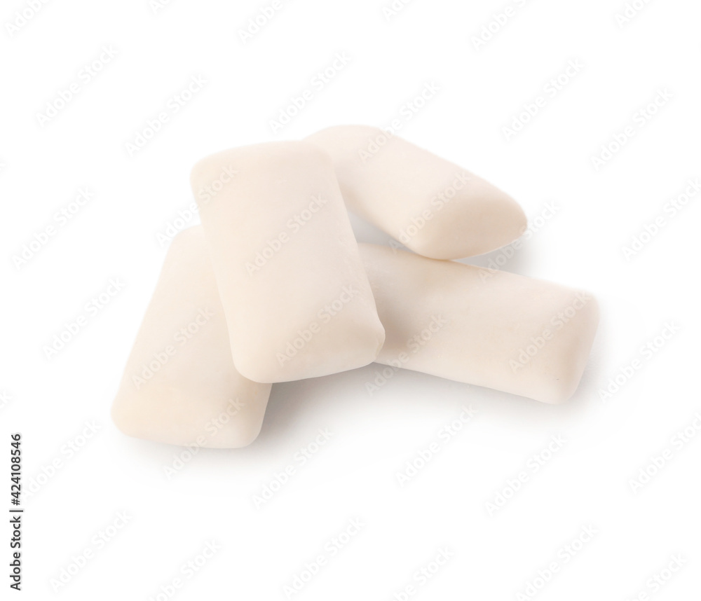 Tasty chewing gums on white background