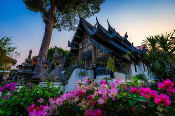 Wat Chedi Luang is a Buddhist temple in the historic centre and is a Buddhist temple is a major tourist attraction in Chiang Mai,Thailand.at twilight time blue sky clouds sunset background.