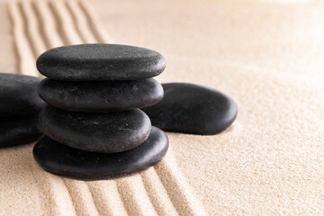 Japanese zen garden with stone in raked sand