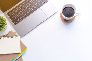 Wall Mural - Top view workspace Laptop with keyboard and coffee cup isolated on white background with copy space