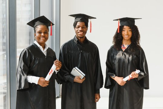optimistic young university graduates at graduation