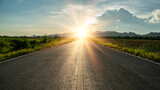 Blurry of road in the middle of asphalt road at sunset.Concept of planning and challenge or career path,business strategy,opportunity and change.New year or start straight concept.