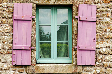 Windows in stone wall