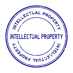 Wall Mural - Grunge blue intellectual property word round rubber seal stamp on white background