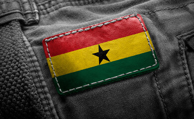 Tag on dark clothing in the form of the flag of the Ghana