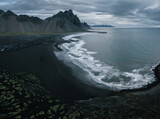 Fototapeta Morze - Aerial drone view of Vestrahorn mountain at Stokksnes cape in East Iceland. Icelandic nature landscape from above