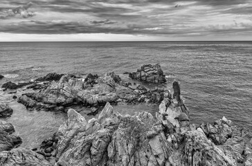 Wall Mural - The coast in Lloret de Mar in black and white