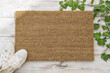 Coir doormat mockup Green plant wooden background