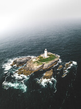 Aerial View Of Godrevy Lighthouse, A Solar Powered Tower On A Tiny Islet In The Celtic Sea, United Kingdom.