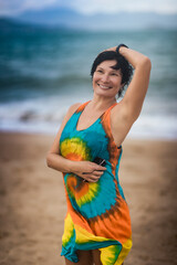 Outdoor portrait of a beautiful woman near the sea