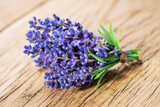 Fototapeta Lawenda - Bunch of lavandula or lavender flowers on the wooden background.