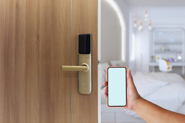 Wall Mural - Mobile unlock Digital door lock security system of apartment door. Electronic door handle with key pads numbers. Selective focus