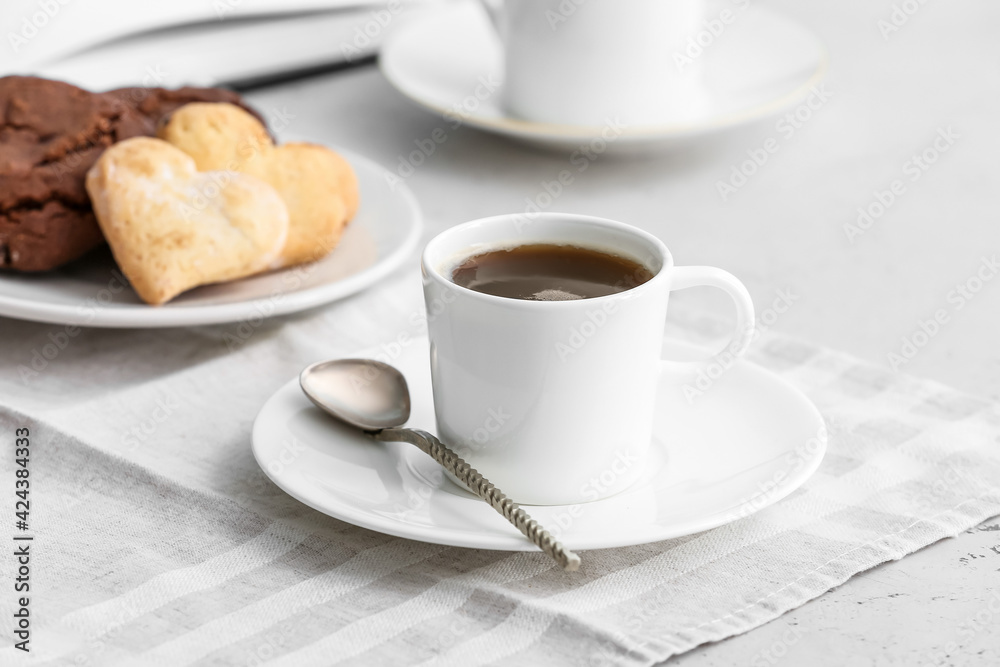 Cup of coffee on table in cafe