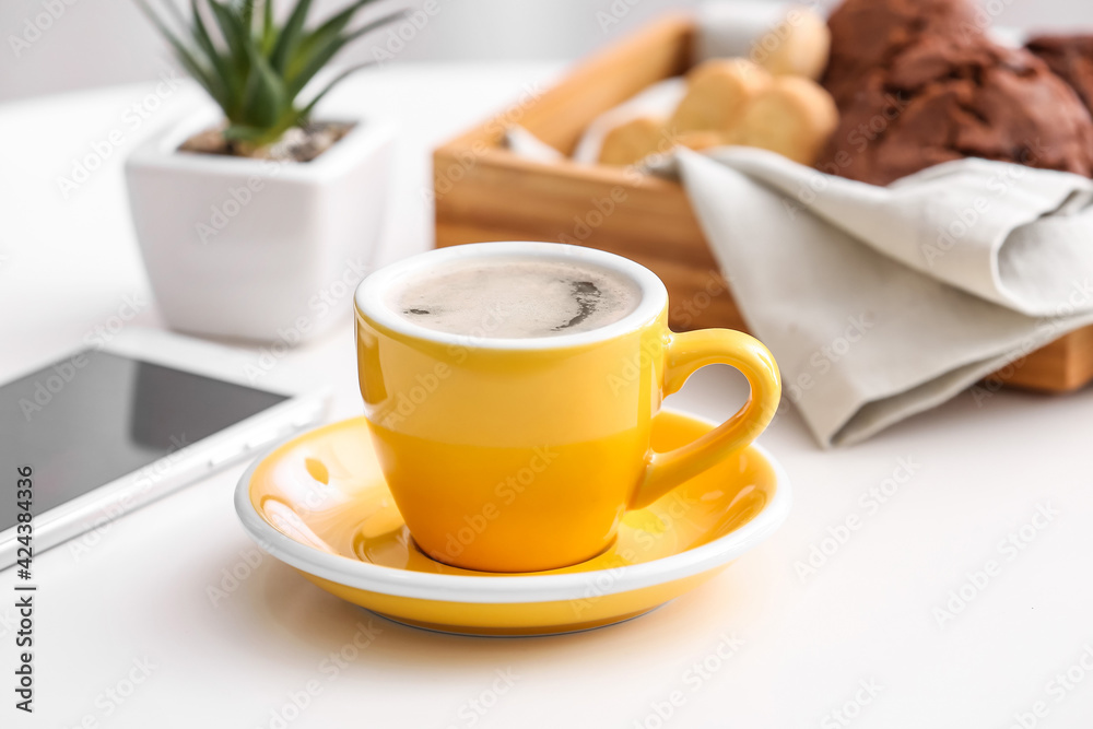 Cup of coffee on table in cafe
