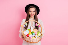 Photo Of Charming Sweet Young Lady Wear White Outfit Cap Holding Easter Bucket Isolated Pink Color Background