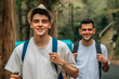 young people hiking, excursion or trekking