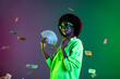 Photo of rich luxury lady hold fan cash dollars fall wear specs sweatshirt isolated gradient green neon background