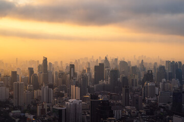 Wall Mural - Aerial view of Bangkok Downtown Skyline, Thailand. Financial district and business centers in smart urban city in Asia. Skyscraper and high-rise buildings at sunset.