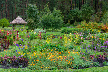 Wall Mural - Well maintained, beautiful part of the garden next to the forest