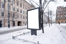 Billboard Vertical In The City. With Snow In Winter.