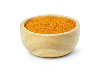 Wall Mural - Turmeric or tumeric powder in wooden bowl isolated on white background. Clipping path.