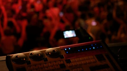 Poster - Close up sound and lighting engineer at an outdoor concert