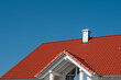 © Carmen Hauser - a tiled roof with clear blue sky