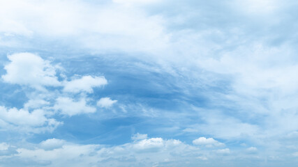 Poster - Blue sky with fluffy white clouds