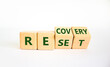 © Dzmitry - Recovery and reset symbol. Turned cubes and changed the word 'recovery' to 'reset'. Beautiful white background. Business and recovery - reset concept. Copy space.