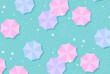 vector background with umbrellas in the rain for banners, cards, flyers, social media wallpapers, etc.