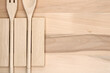 Close-up of a Table to cut food accompanied by wooden cutlery