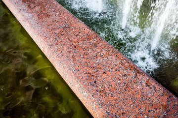 a beautiful stone fence divides into two parts