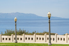 Cliffside Park With Cement Fence And Lamp Posts, Overlooking The Ocean And Catalina From Pt Fermin Park In San Pedro, CA 