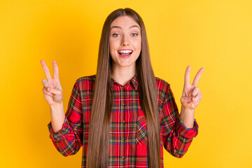 Poster - Portrait of nice brunette long hairdo lady show v-sign wear red shirt isolated on vivid yellow color background