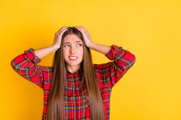 Canvas Print - Portrait of attractive worried girl wearing checked shirt oops wrong decision copy space isolated over bright yellow color background