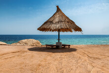 Parasols In Beautiful Coral Sunny Beach In Red Sea, Egypt,  Africa.