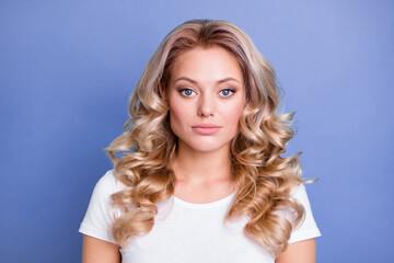 Wall Mural - Photo of young charming pretty beautiful businesswoman with blonde wavy hair isolated on blue color background