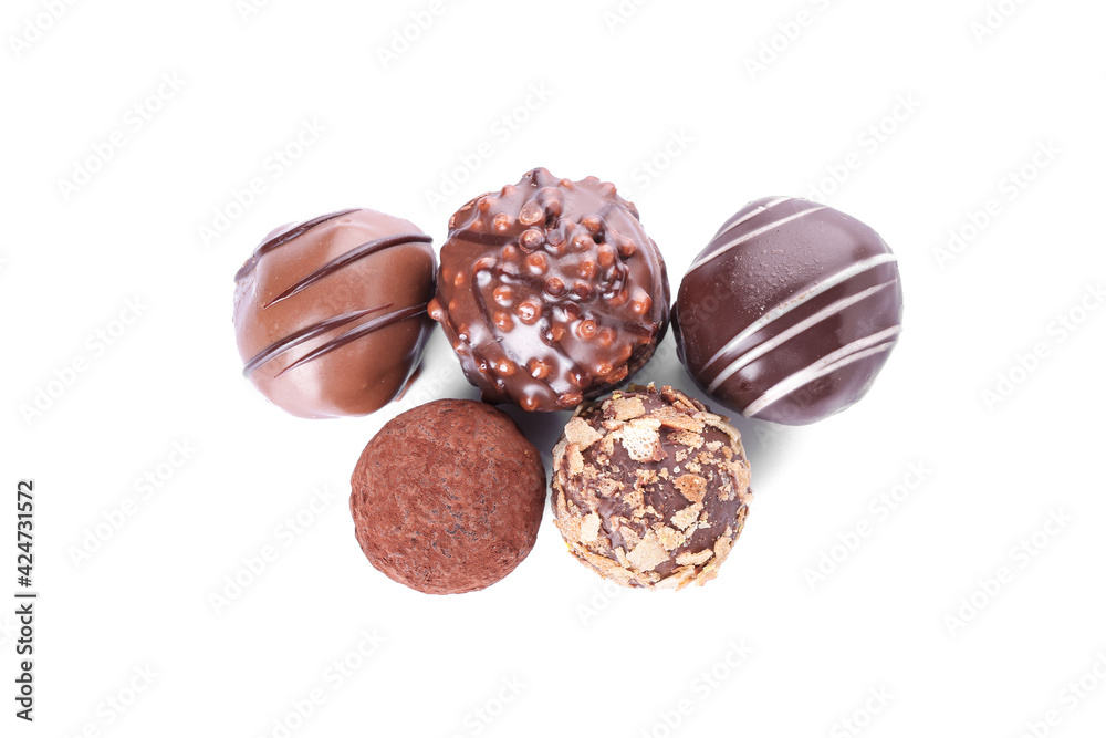 Sweet chocolate candies on white background