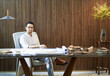 © allensima - Asian bearded designer sitting, thinking and sketching ideas indoors