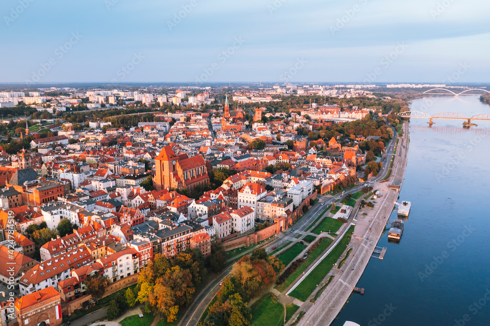 Aerial view of Torun city with Vistula river during sunset , Poland  - obrazy, fototapety, plakaty 