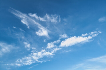 Blue summer sky with white cumulus clouds. Blue sky with clouds nature background.