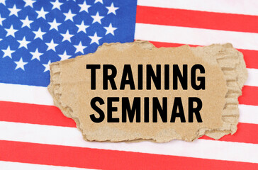 On the US flag lies a cardboard box with the inscription- TRAINING SEMINAR