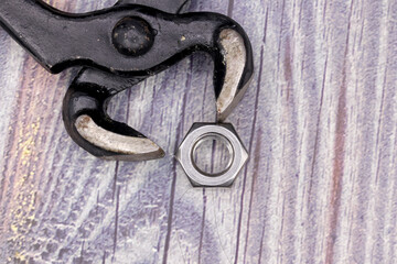 old rusty repair tools on wooden background