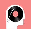 © paul_craft - Music listening concept with side view human head silhouette and vinyl disc inside. Musical poster or banner concept. Isolated on red background. Minimalistic vector illustration.