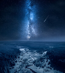 Wall Mural - milky way and falling stars over curvy river and swamps.