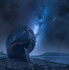 Wall Mural - shipwreck in fort william and milky way. tourism in scotland